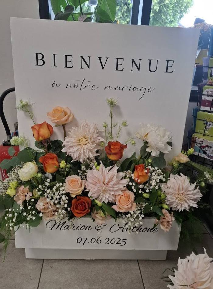 Panneau de bienvenue fleuri pour le mariage de Marion et Anthone